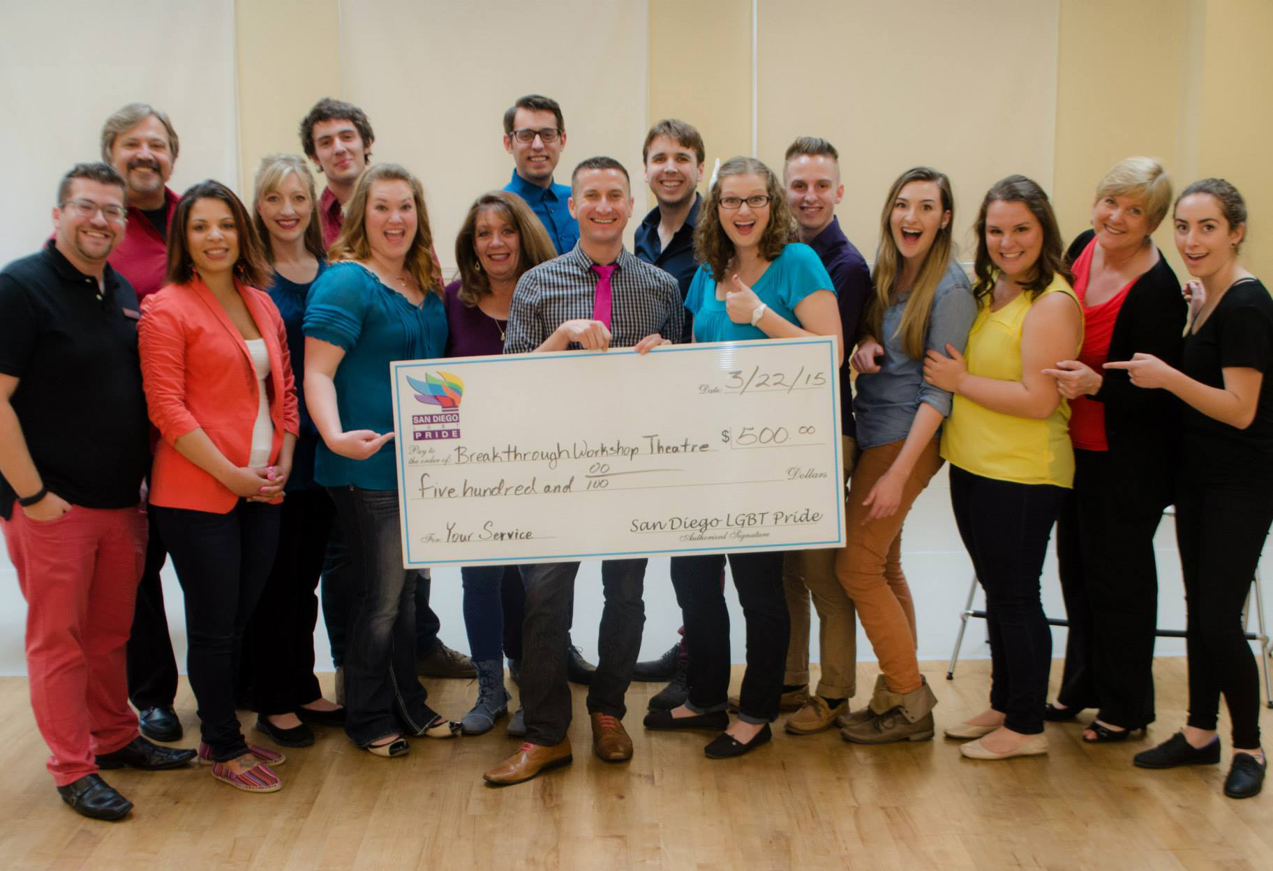 San Diego Pride giving check to community members