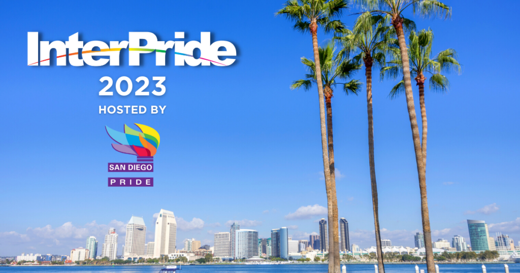 Palm trees with the San Diego Skyline in the background. Text reads Interpride 2023 hosted by San Diego Pride (logo).