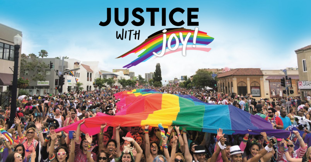 Justice with Joy logo and picture of Pride Parade with large rainbow flag