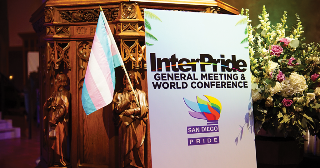 An InterPride Sign resting on a podium at the Welcome Reception